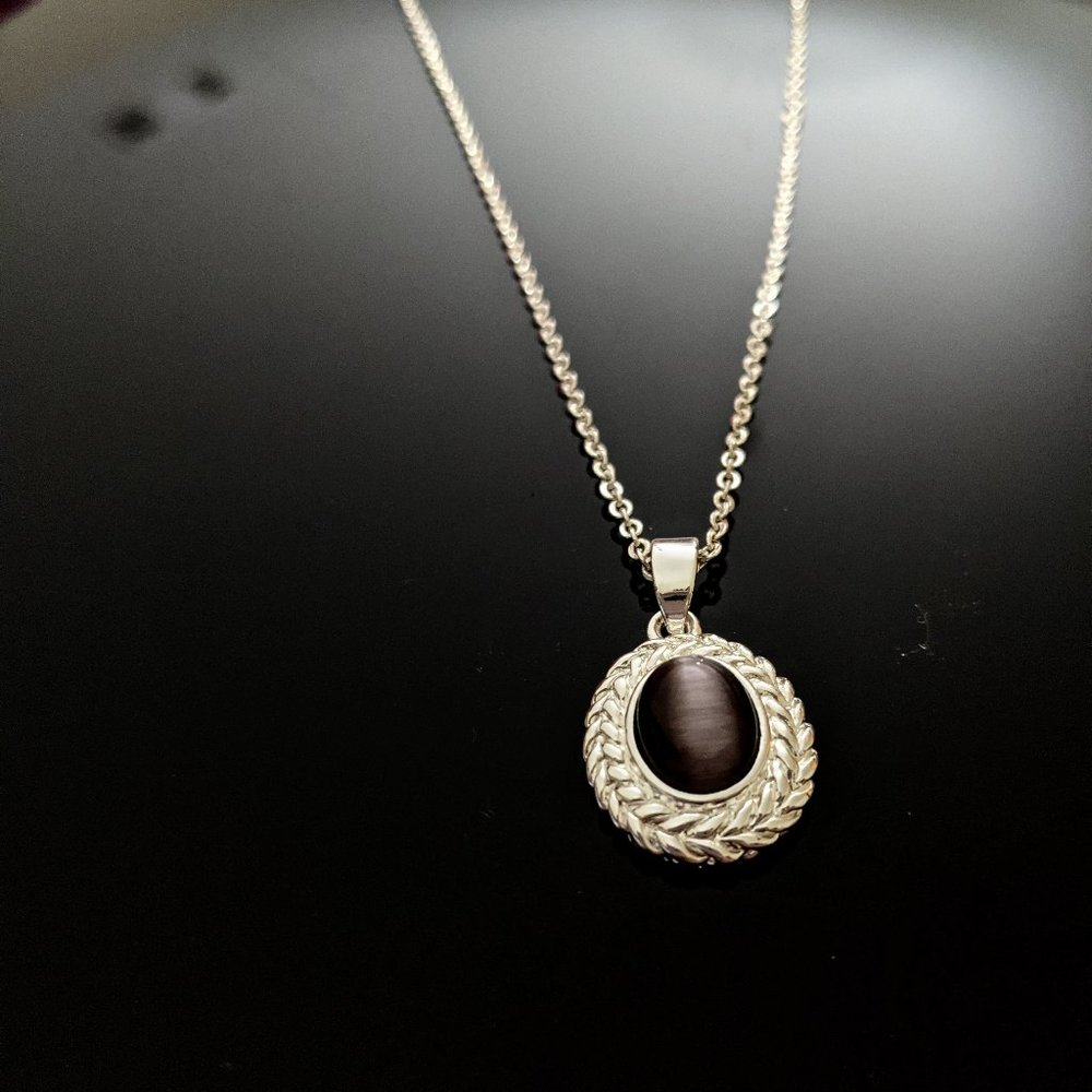 Purple medallion necklace